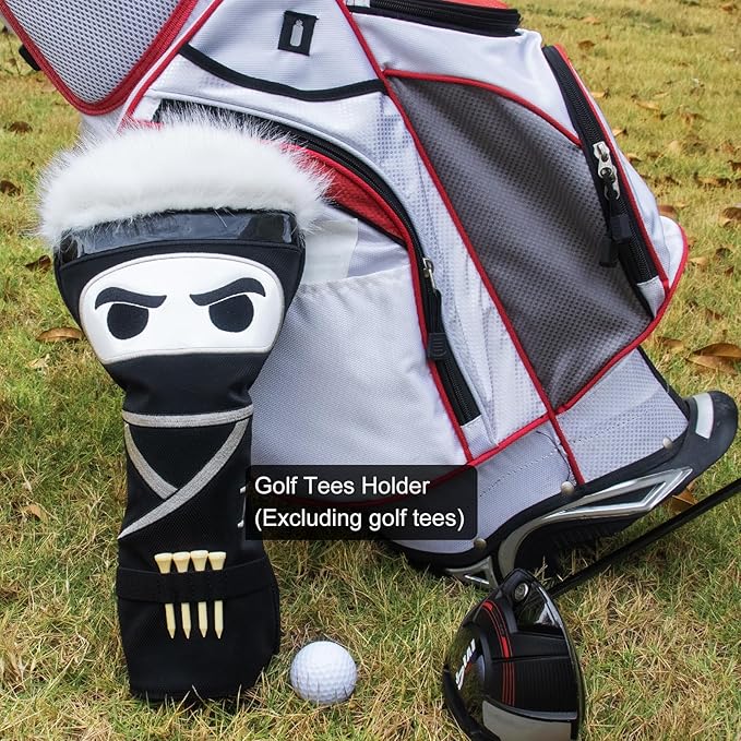 Golf bag with a black and white ninja character head cover on a grassy background