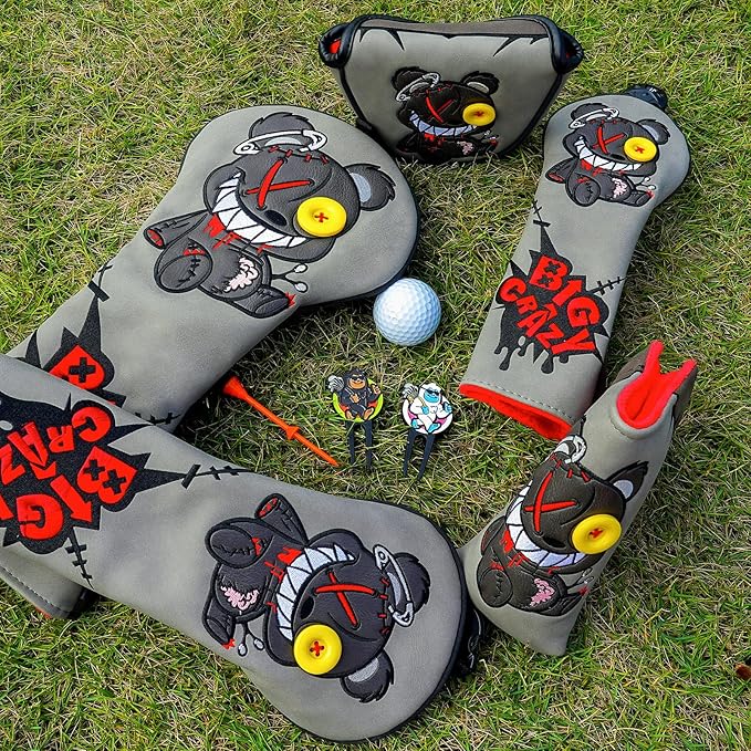 Golf club head covers with Grey Bear Driver Coverr on grass